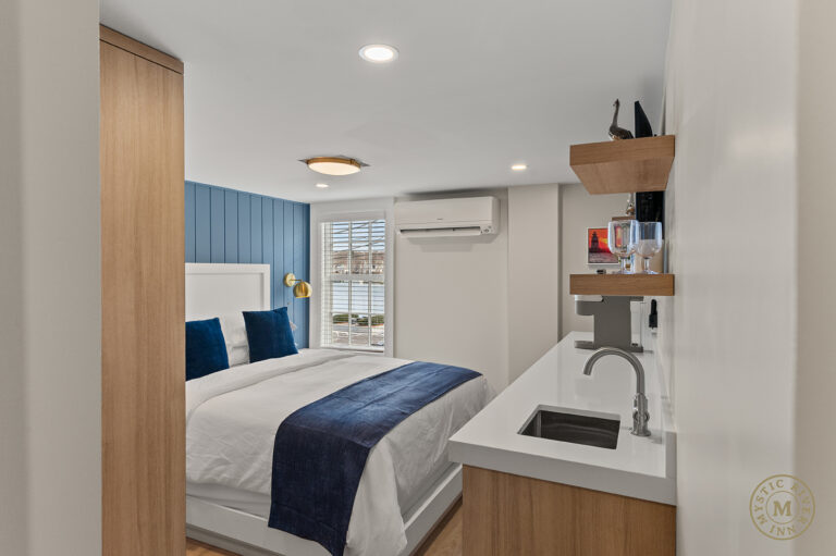 Lighthouse Suite bedroom area at Mystic River Inn.